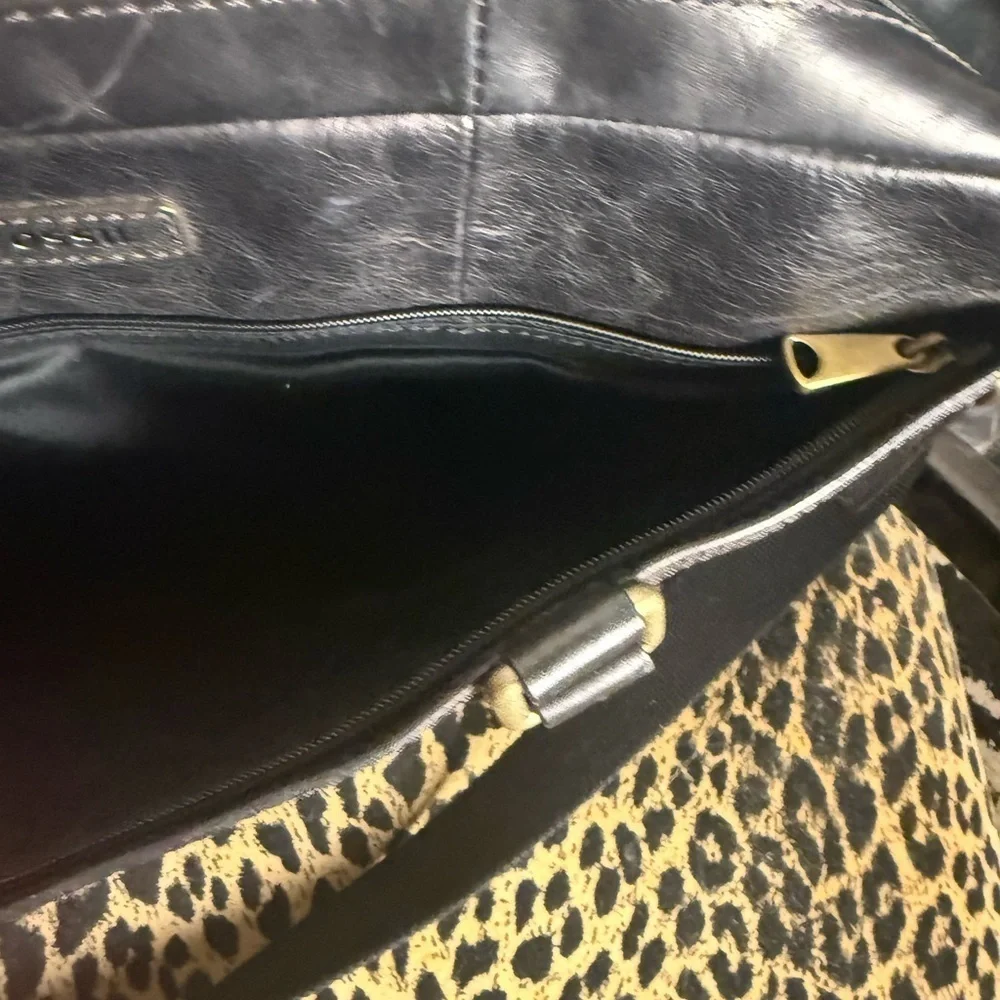Fossil Leather Black and Gold Briefcase with Elegant Design